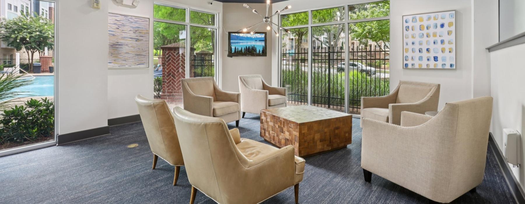 a room with a table chairs and a couch