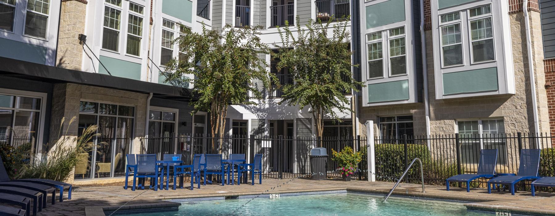 a pool in front of a building